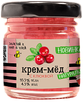 Creamed honey with cranberries